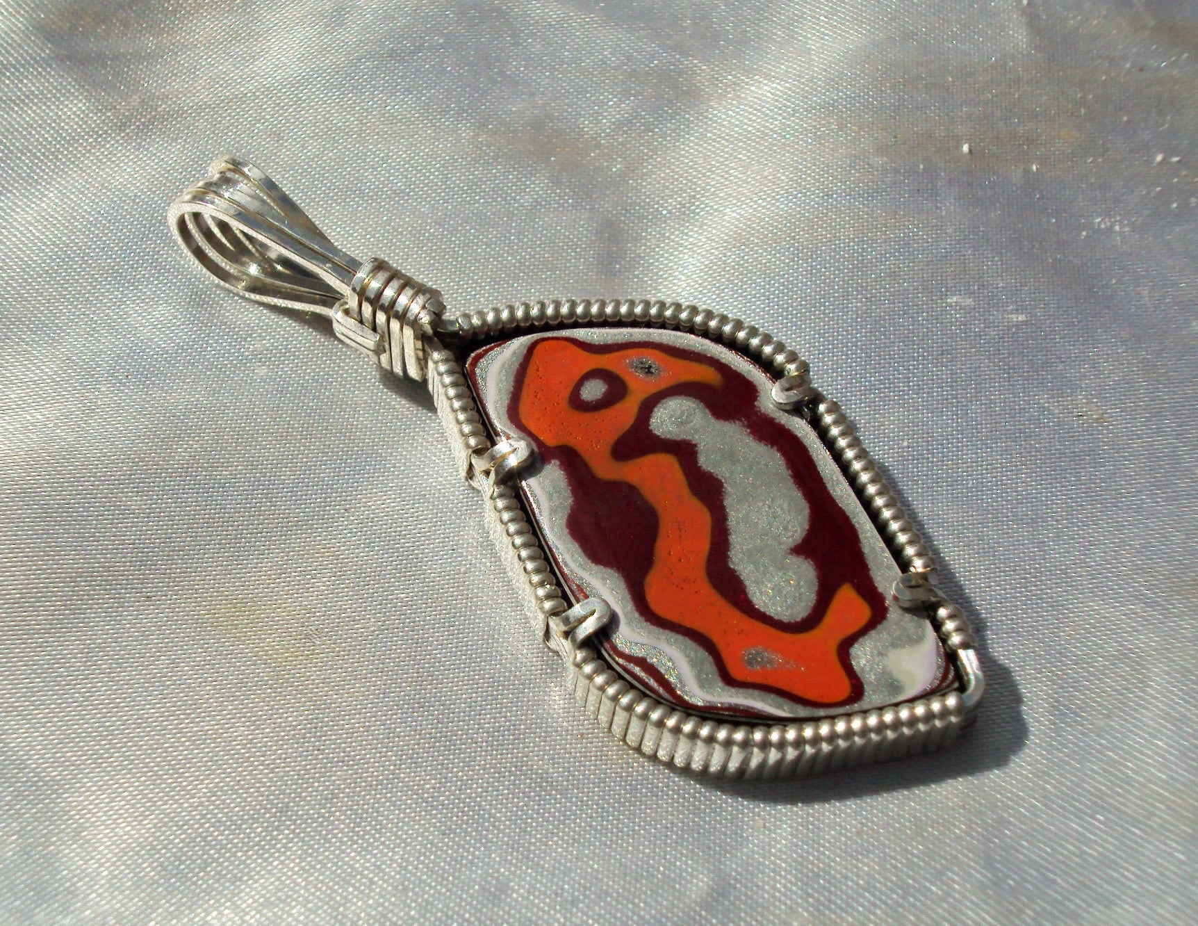 Fordite in Silver -- Ptreod